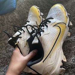 Football/soccer cleats.