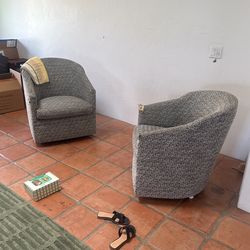 Two Swivel Chairs