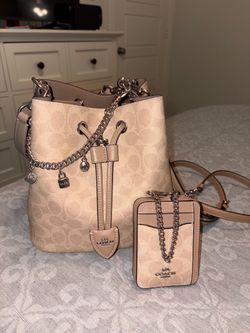 Authentic Coach Rowan Bucket Bag in Signature Canvas with Coach Retail Swagger Chain + matching wallet