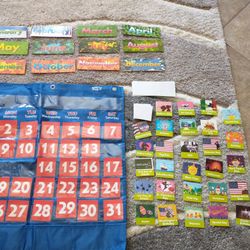 Classroom calendar includes months, dates, blank for fill in your own & Holiday inserts