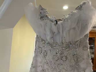 Hand Sewing Pearls And Swarovski Crystals Wedding Gown