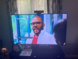 65 In. Samsung Tv With Remote And Swivel Tv Stand 