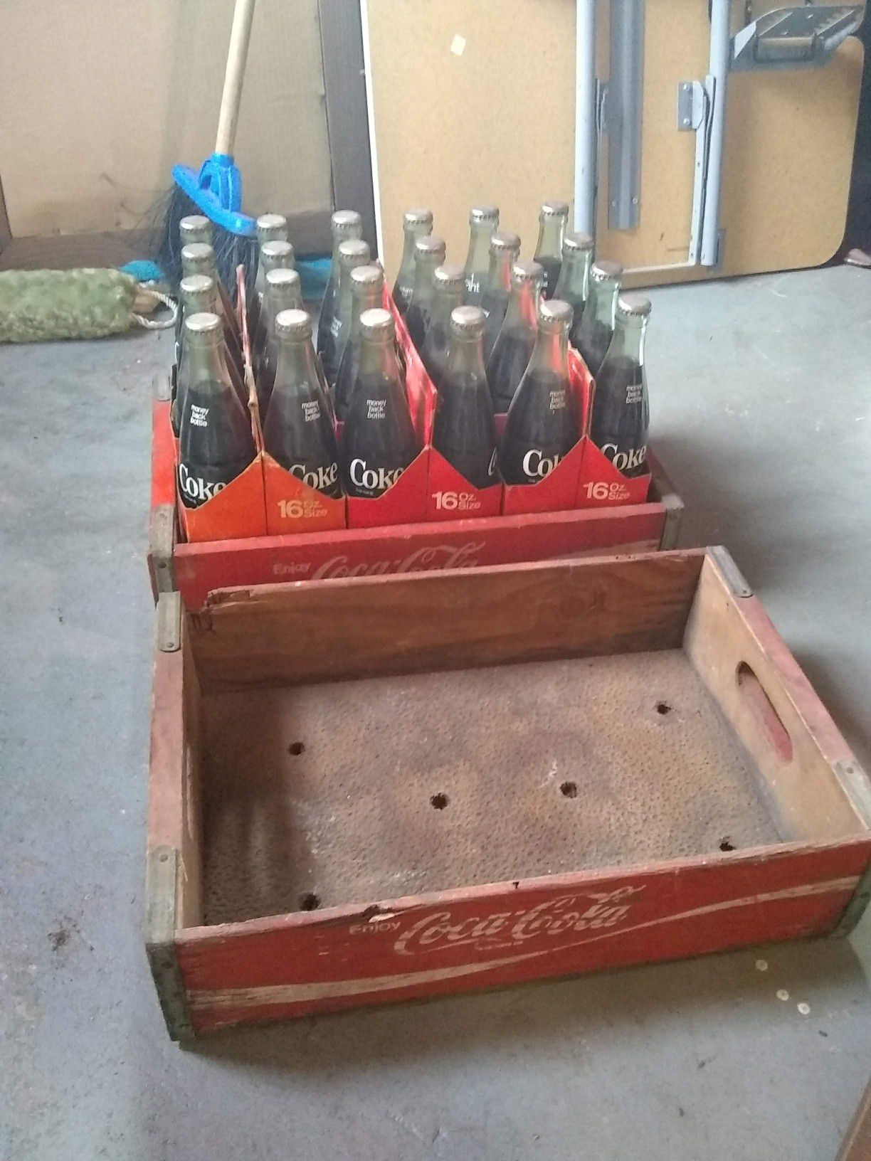 Coca cola bottles and case never opened