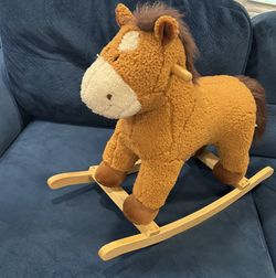Rocking riding horse toy