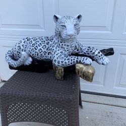 Snow Leopard On The Log Statue 