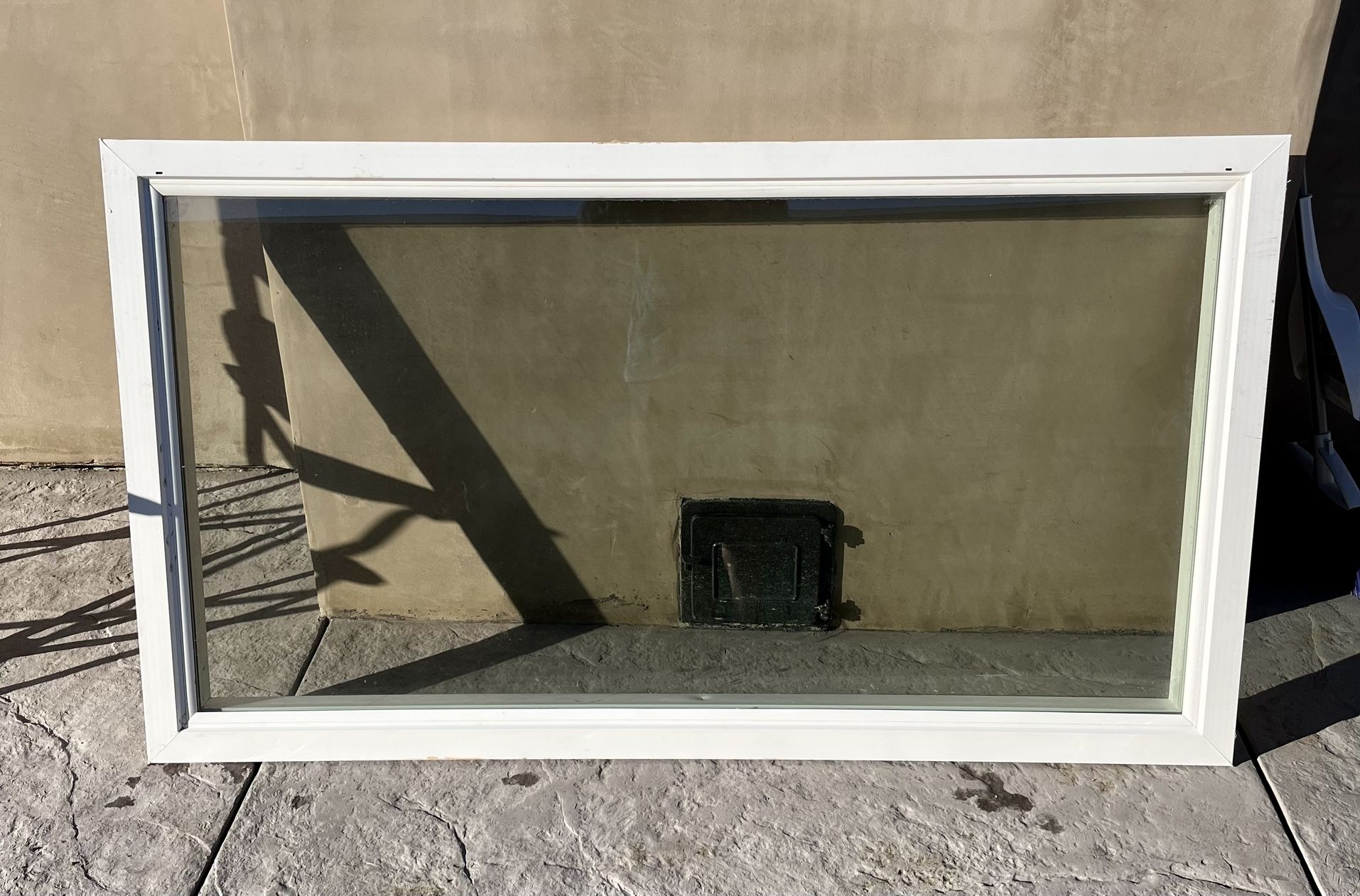 White Dual pane solid framed window, 33x61.5in