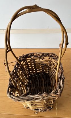 Woven basket, 6”X6 1/2”X10” tall to top of handle.