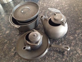 antiquarian Kettles and cast iron skillet