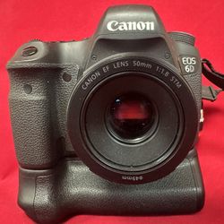 Canon D6 W/ 50mm And Battery Packs