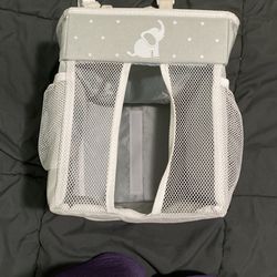 Baby diaper holder for crib