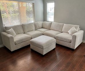Stunning sectional sofa with ottoman Ivory Corduroy new in box