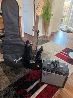 Squier Stratocaster package. Amp. Gig bag like new.