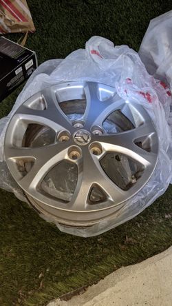 4x Mazda stock alloy rim wheel
