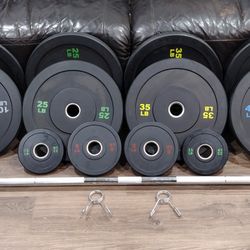 OLYMPIC  BARBELL BAR  7ft.
 45lb. AND OLYMPIC BUMPER
  WEIGHT  PLATES.
