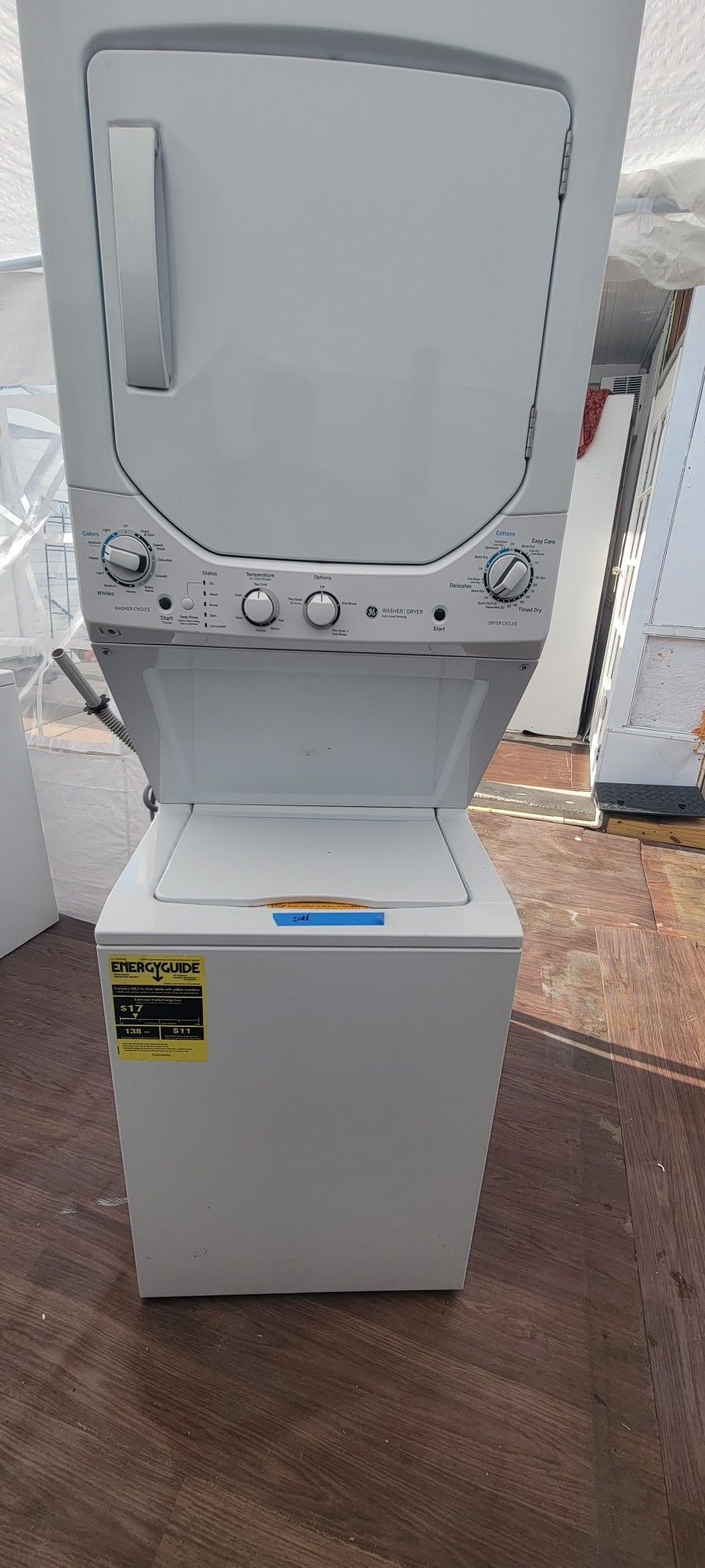 KENMORE WASHER AND DRYER 24"S STACKED UNIT PERFECTLY WORKS