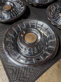 56 Cadillac Hub Caps