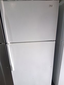 Whirlpool top and bottom apartment side fridge with ice maker fully functional