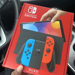 Nintendo Switch OLED BRAND NEW NEVER OPENED