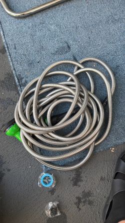 stainless steel metal garden hose .
