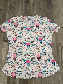 Hello Kitty, Care Bears and Minnie Mouse Scrub Tops. Lot of 4 size small