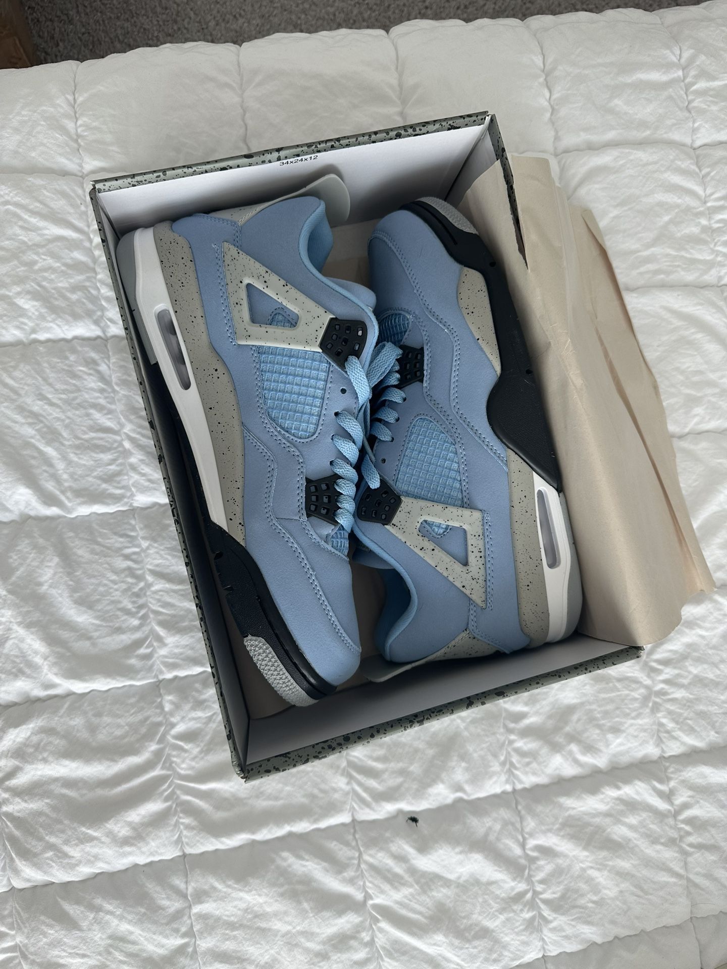 Jordan 4 University Blue