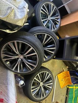 Set of 4 OEM Infiniti Q60 19” wheels with tires.