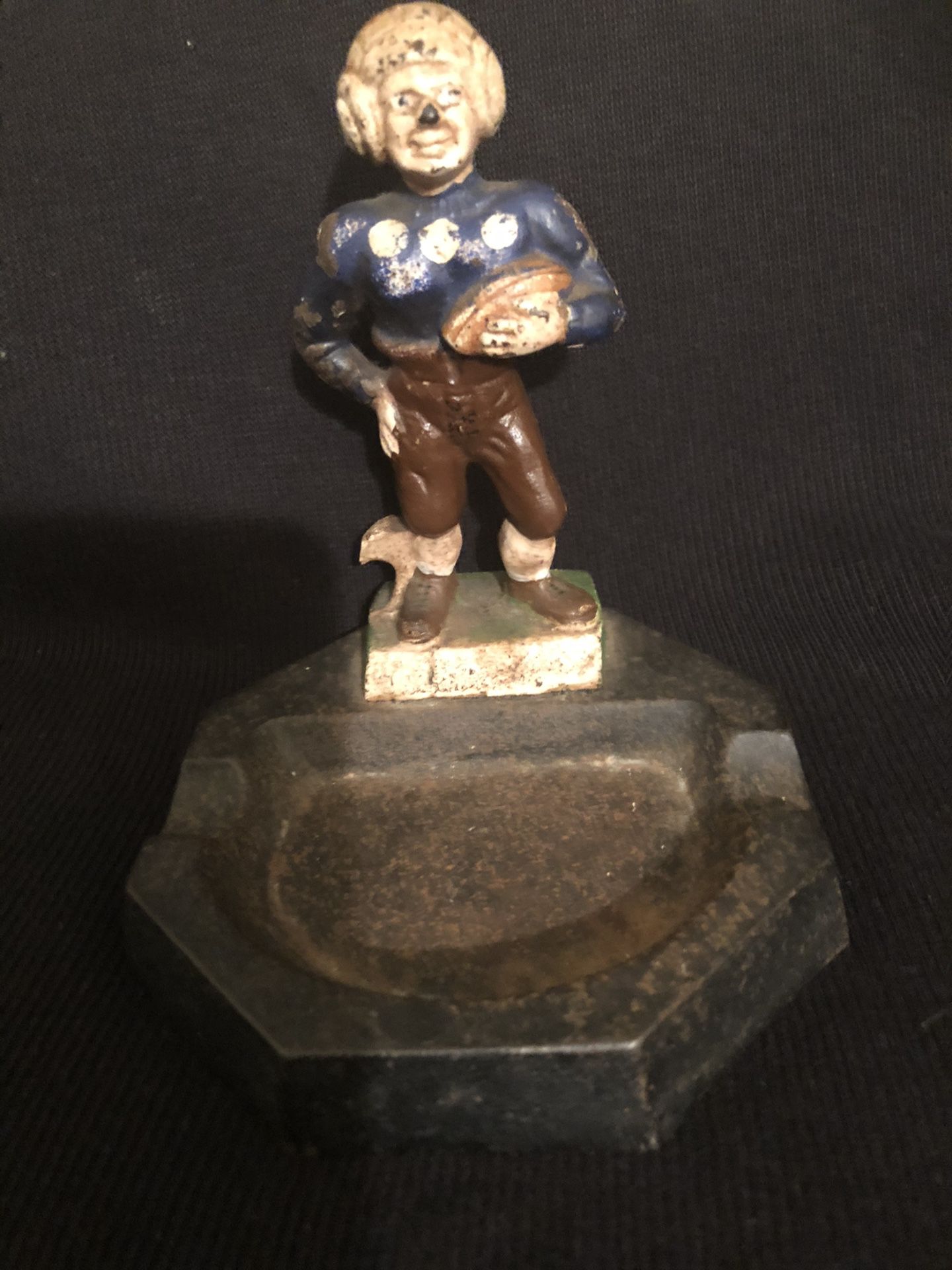RARE ANTIQUE CAST IRON FOOTBALL PLAYER BOTTLE OPENER/ASHTRAY BY L & L FAVORS
