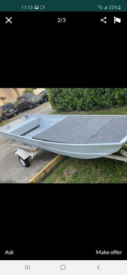 Jon boat 9.8 mercury and trolling motor (will trade for jetski)
