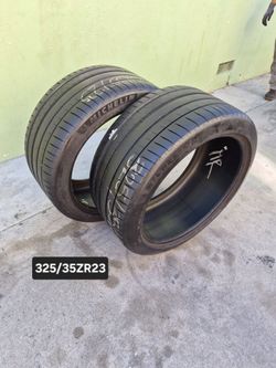325/35R23