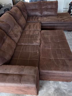 Brown 3 pc sofa with ottoman