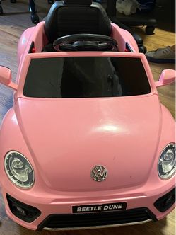 Barely used Volkswagen toy car 12v  with remote and charger