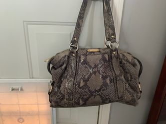 Michael Kore snake print bag