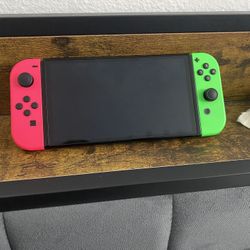 Nintendo Switch Bundle – OLED + Regular Switch + Games