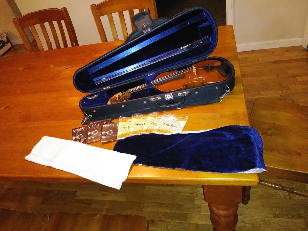 Half size violin, case and bow