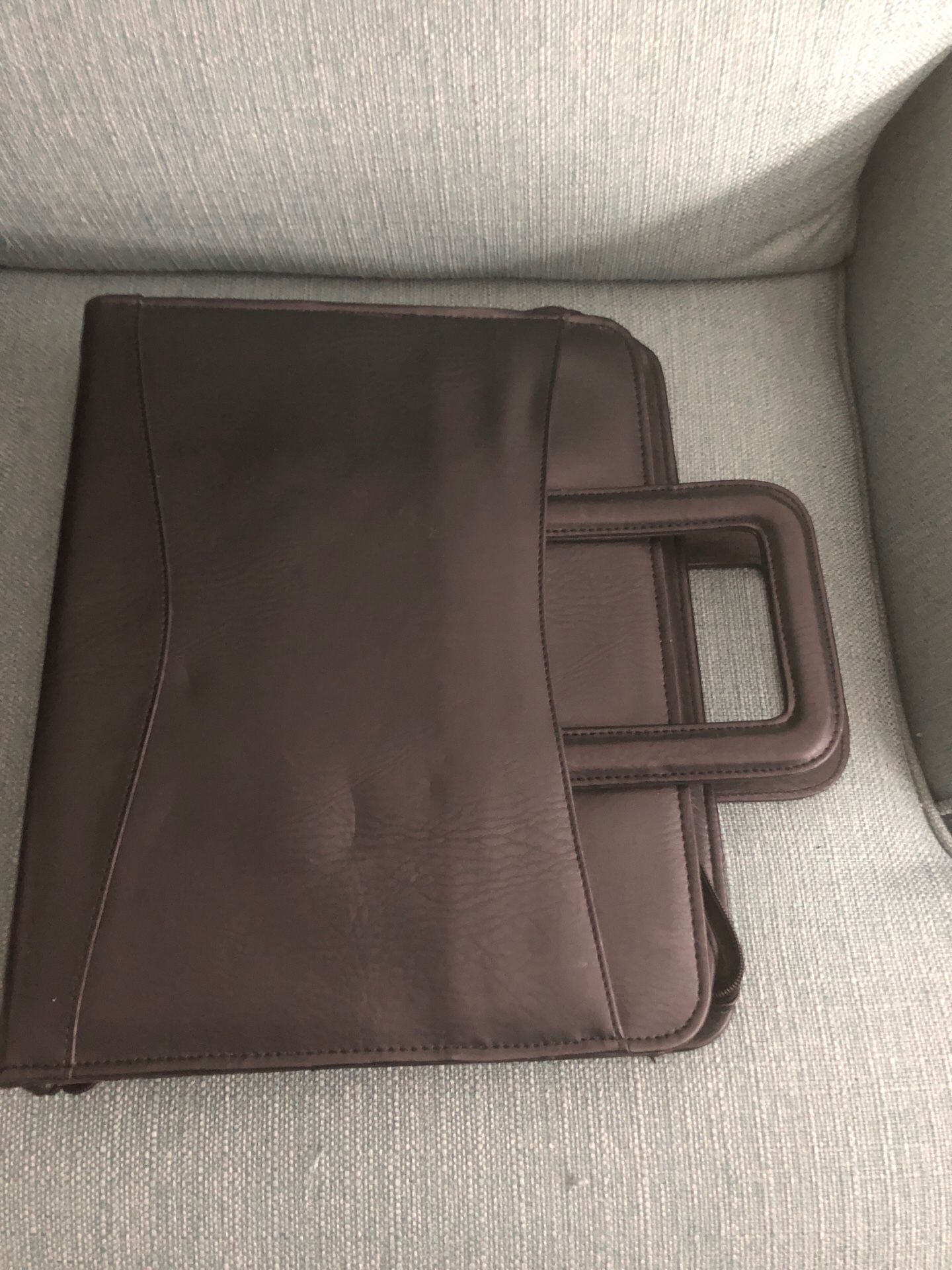Leather brief case with retractable handles