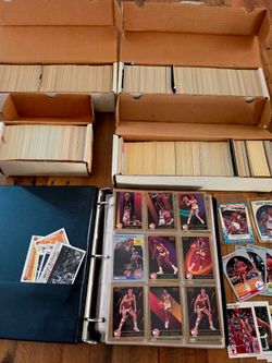Extensive collection of vintage NBA basketball cards and baseball