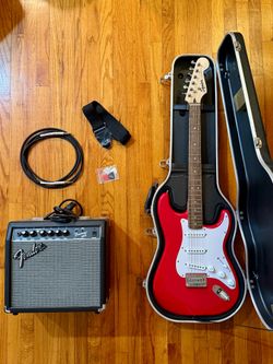 Squier Strat, hard case, Fender 20W amp, accessories