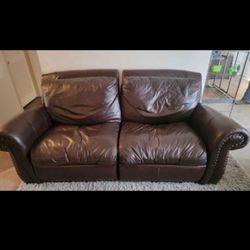 Set of Brown Leather Reclining Loveseats