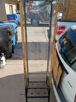 Lighted wrought iron metal glass display cabinet no offers no trades 75th Ave Indian School serious buyers only please