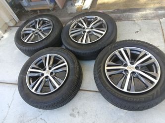 Set of 4 18in 5 lug rims and tires