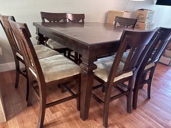 Bar height table and chairs
