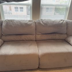 Beige Sofa - Dual Reclining Seats