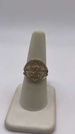 14k  Logo gold tone ring with CZ’s