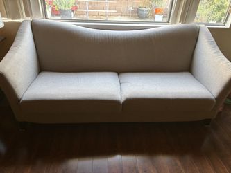 2 Sofas. ($60) 3 + 2 Seater