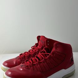 red jordan aura 11s