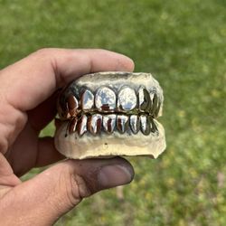 NEXT DAY $ERVICE GOLD GRILLZ 