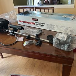 In the box.  Never been used before.  Scotty #1106B Depthpower Electric Downrigger