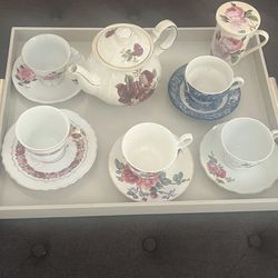 Victorian Tea Set With Assorted Cups And Saucers