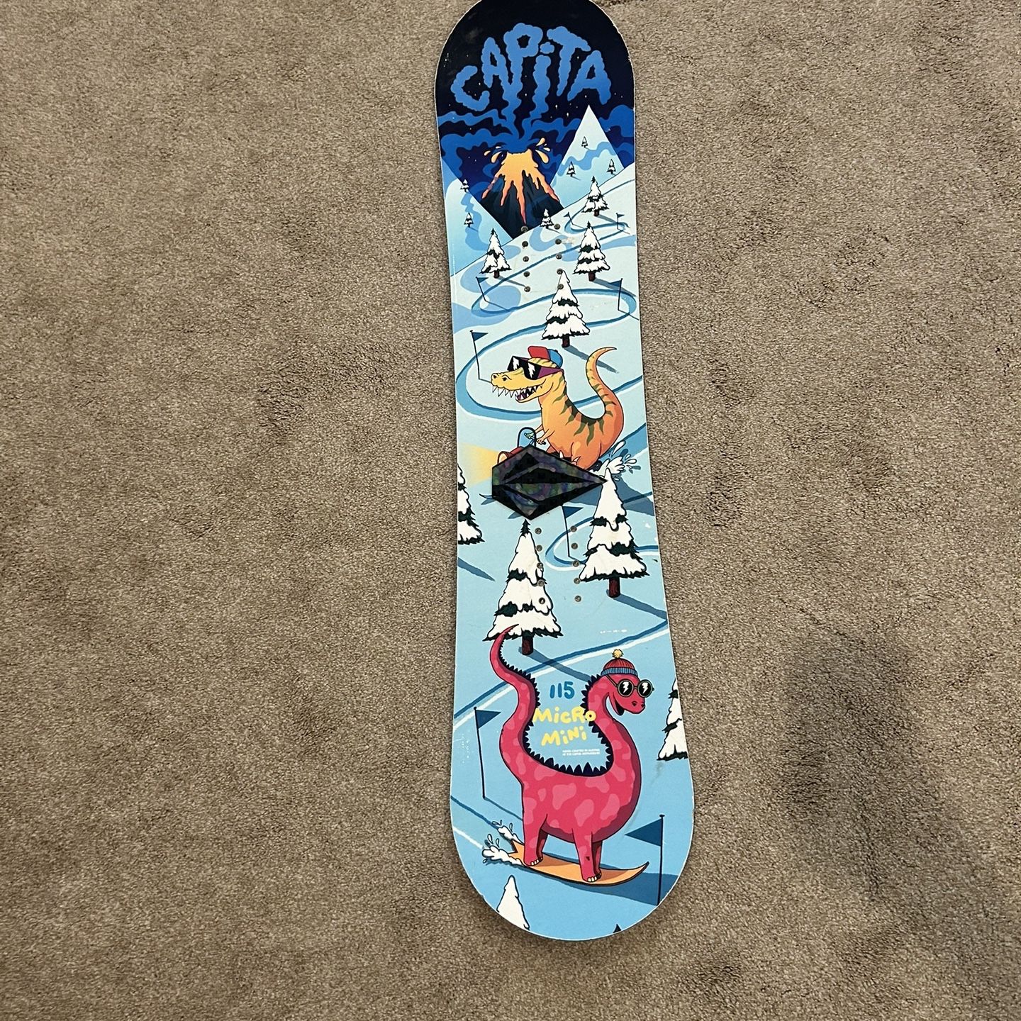 capita micro mini snowboard Youth Scott Stevens 2026 130 The Micro Mini is the perfect snowboard for kids getting their first experiences in the snowboarding game Capita Micro Mini Snowboard -