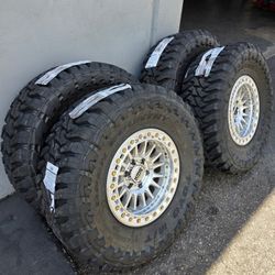 17" Kmc beadlocks w/ 35" Toyo MT Tires. $2800 !!!